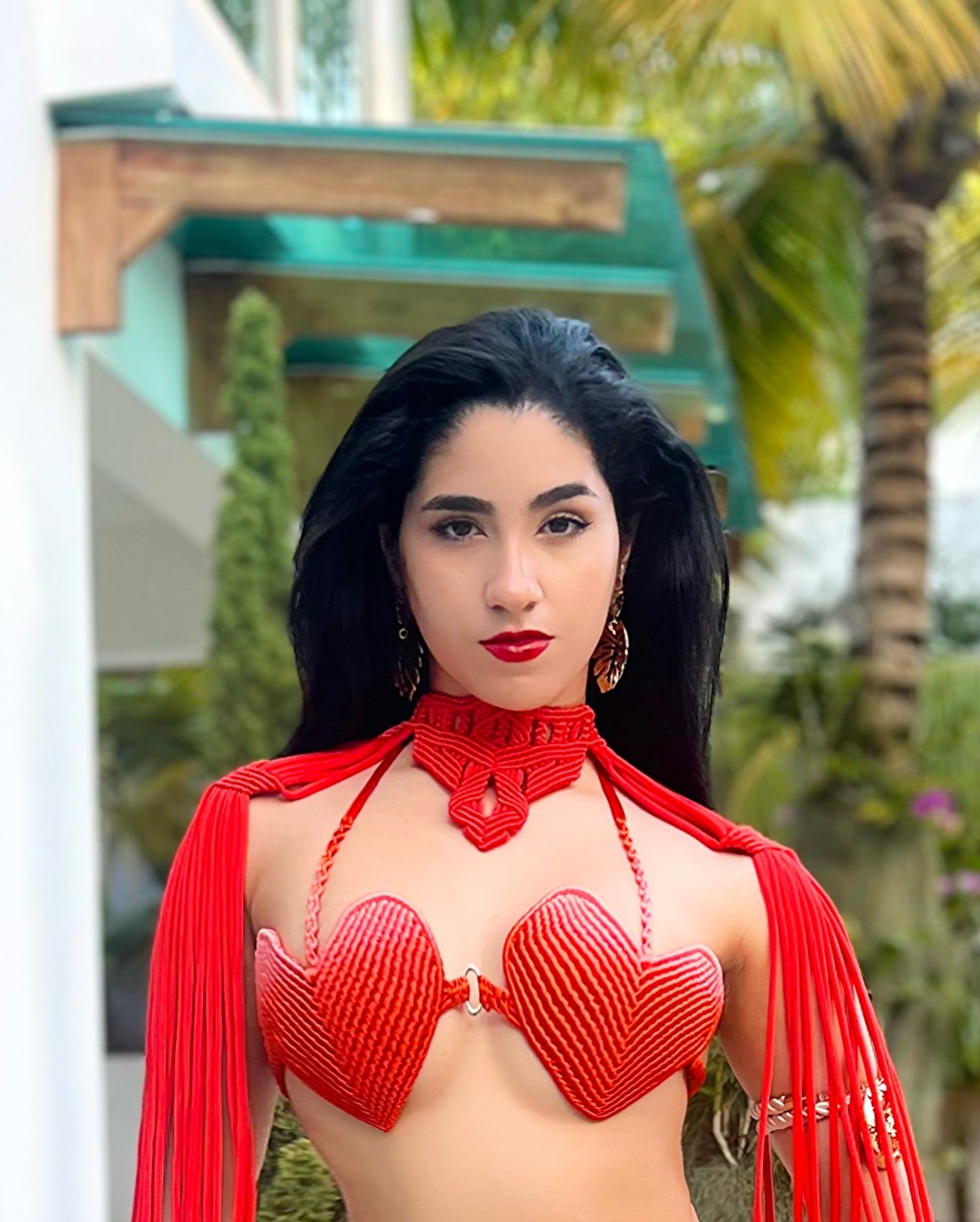 Red swimsuit with heart shape hand woven by hand