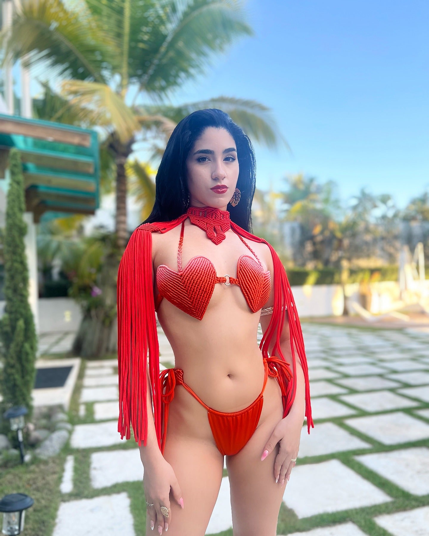 Red swimsuit with heart shape hand woven by hand